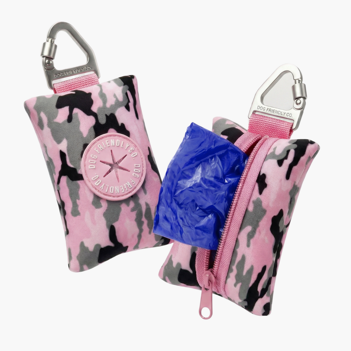 Pink Camo poop bag holder showing a blue poop bag being dispensed from the zippered compartment