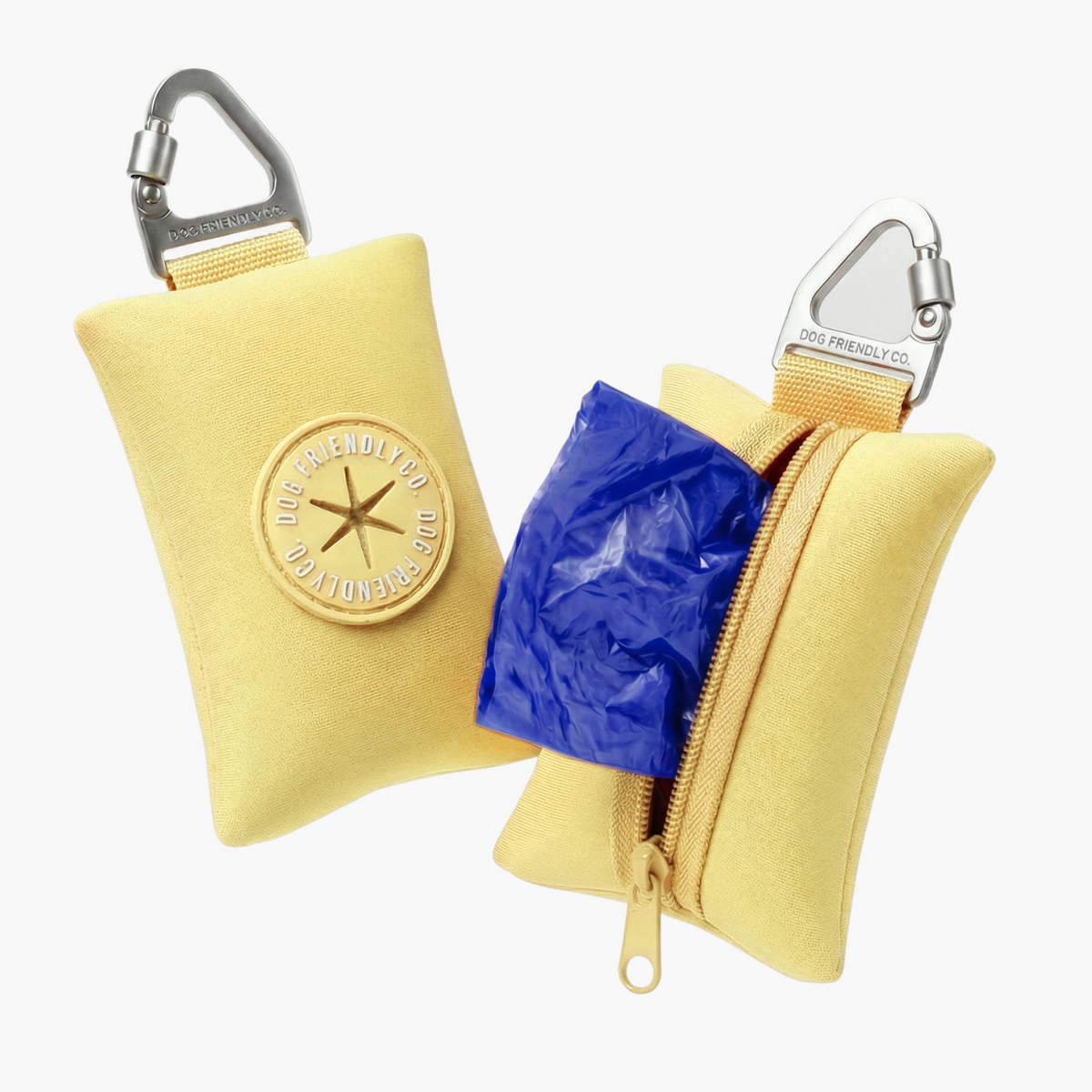 Yellow poop bag holder showing a blue poop bag being dispensed from the zippered compartment