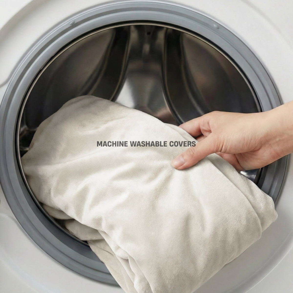 Beige replacement cover being removed for machine washing.
