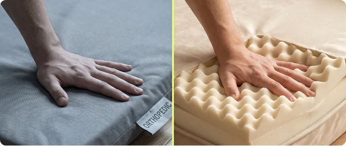A hand pressing into a flat bed tagged orthopedic on the left, and into egg-crate foam on the right.